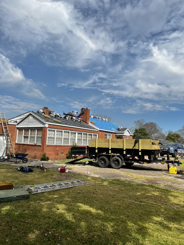 Slide of Ram's Roofing Service