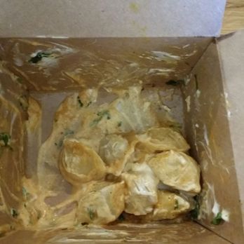 Paul's Pel'meni - Beef Pelmeni with the works sour cream, cilantro, Sriracha, vinegar, yellow curry powder. - Russian Near Me - Madison, Wisconsin Paul's Pel'meni - Beef Pelmeni with the works sour cream, cilantro, Sriracha, vinegar, yellow curry powder. - Russian Near Me - Madison, Wisconsin