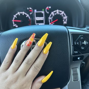 Liberte Nails - Yellow with red, yellow and gold marble for Chinese new year - Nail Salons Near Me - Beaufort, South Carolina