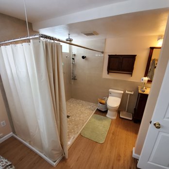 Premium Remodeling - a bathroom with a shower and toilet - General Contractors Near Me - Encino, California Premium Remodeling - a bathroom with a shower and toilet - General Contractors Near Me - Encino, California