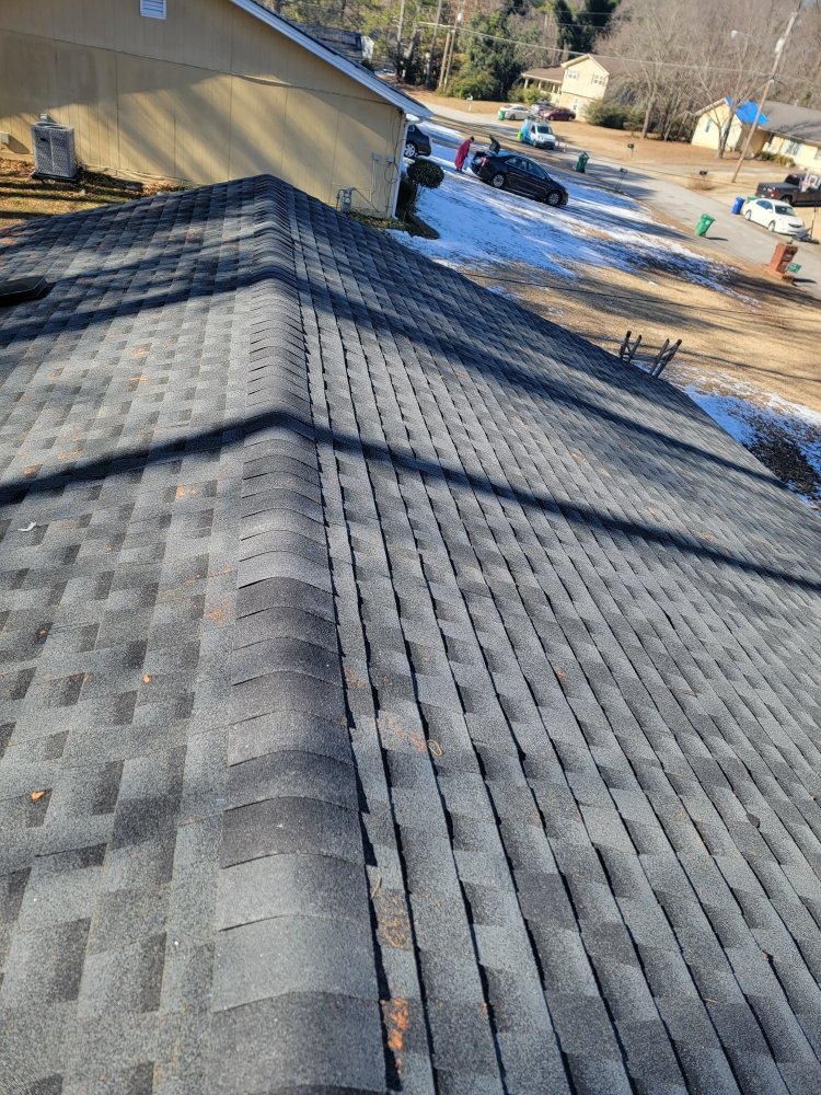 Slide of Jimenez Roofing