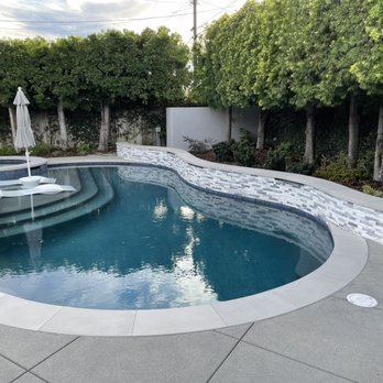 Sunset Designers & Builders - After Image of pool, spa and added Baja Shelf. - Pool & Hot Tub Service Near Me - Los Alamitos, California Sunset Designers & Builders - After Image of pool, spa and added Baja Shelf. - Pool & Hot Tub Service Near Me - Los Alamitos, California