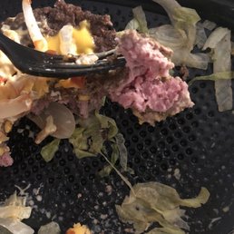 a plate of food with a fork sticking out of it