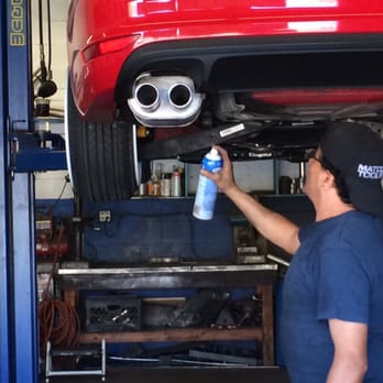 Super Tek Performance - Here he is cleaning polishing the that new muffler. - Auto Repair Near Me - Glendora, California Super Tek Performance - Here he is cleaning polishing the that new muffler. - Auto Repair Near Me - Glendora, California