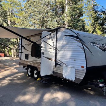 Always an Adventure RV Rentals - 2019 Forest River Wildwood is perfect for couples or small families! It has a queen bed and two bunks. - Trailer Rental Near Me Always an Adventure RV Rentals - 2019 Forest River Wildwood is perfect for couples or small families! It has a queen bed and two bunks. - Trailer Rental Near Me