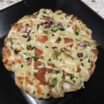 CocoBear Nutrition - a pizza covered in cheese and bacon - Juice Bars & Smoothies Near Me - Spring Hill, Florida