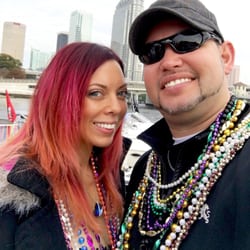 Liquid Hair Studio - Color and cut by Carey at Liquid Hair Studio - photo at Gasparilla. Roots are red, then ombre into pink and light orange. Such a fun color!