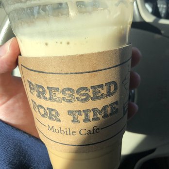 Pressed For Time - a hand holding a cup of coffee - Coffee & Tea Near Me - Derry, New Hampshire