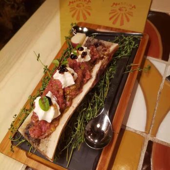 Madrina Bar y Tapas - Steak Tartare on a Roasted Marrow Bone - Tapas Bars Near Me - Toronto, Ontario Madrina Bar y Tapas - Steak Tartare on a Roasted Marrow Bone - Tapas Bars Near Me - Toronto, Ontario