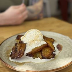 Cuates Kitchen - Fried plantains with whipped cream and berry jam