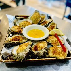 Olde East Hill Grill - Fresh Parma Broiled Oysters come with the most amazing garlic butter. Moi fave, Sir Hubbers fave. Winners Circle :)...