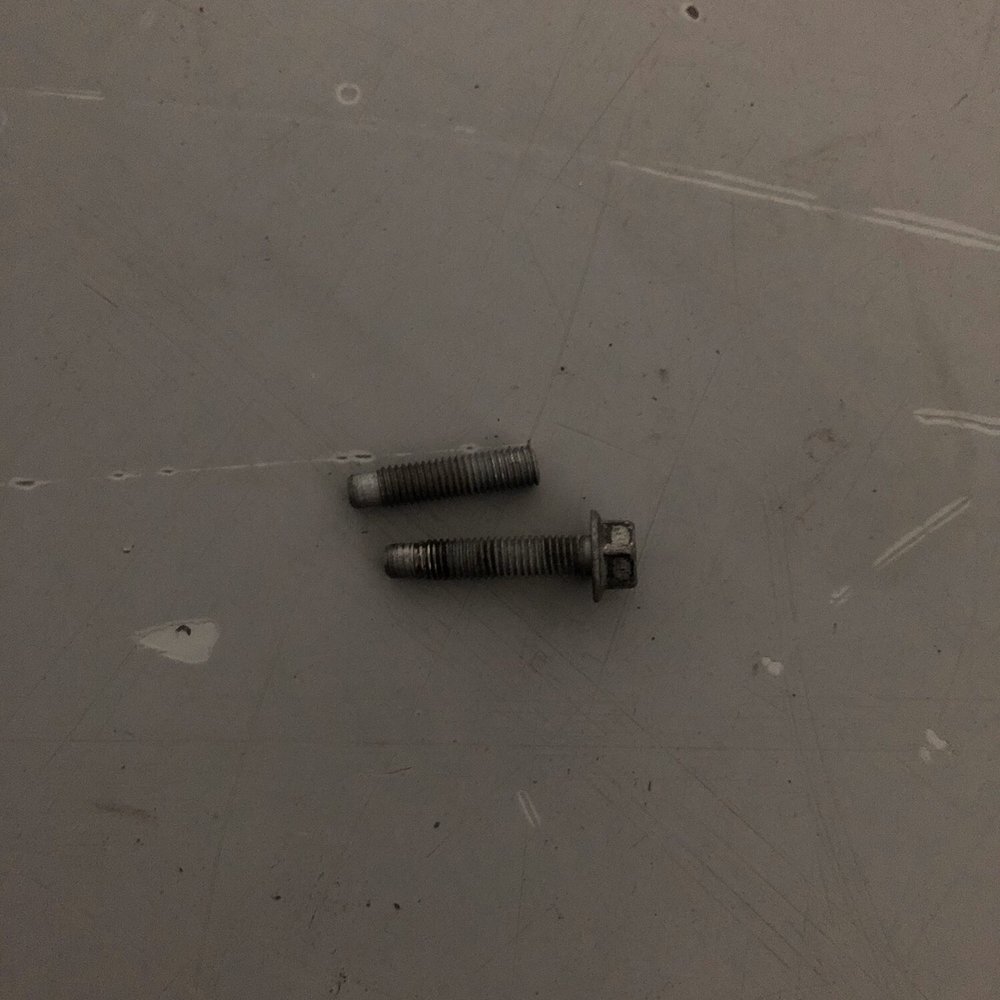 Tameron Honda - Showing the Bolt that was broken in half versus the one that was backed halfway out - Auto Repair Near Me - Birmingham, Alabama Tameron Honda - Showing the Bolt that was broken in half versus the one that was backed halfway out - Auto Repair Near Me - Birmingham, Alabama