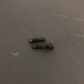 Tameron Honda - Showing the Bolt that was broken in half versus the one that was backed halfway out - Auto Repair Near Me - Birmingham, Alabama
