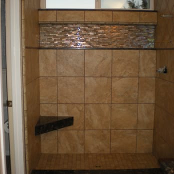 Malin Tile & Flooring - Porcelain tile shower with quartz seat, curb, shelf and window sill and glass tile niche. - Flooring Near Me - Los Angeles, California