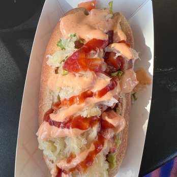 Rock n Roots - Carrot Dog with all the toppings... the flavor is off the charts and satisfies any hotdog craving! - Salad Near Me - Williston Park, New York