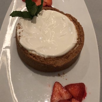 Ruth's Chris Steak House - Delicious cheesecake topped with sour cream! - Steakhouses Near Me - Jersey City, New Jersey