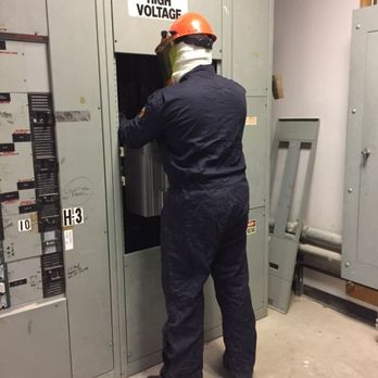 Merlan Electrical Services - Checking incoming power from utilities inside switch gear. - Electricians Near Me Merlan Electrical Services - Checking incoming power from utilities inside switch gear. - Electricians Near Me