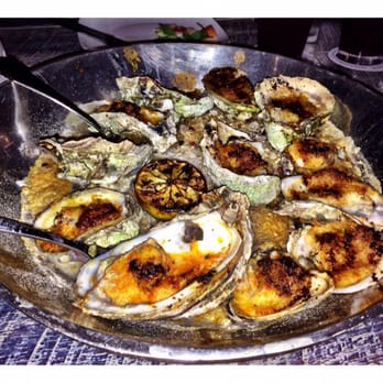 Caracol - Must eat dish - Wood roasted oysters - Seafood Near Me - Houston, Texas