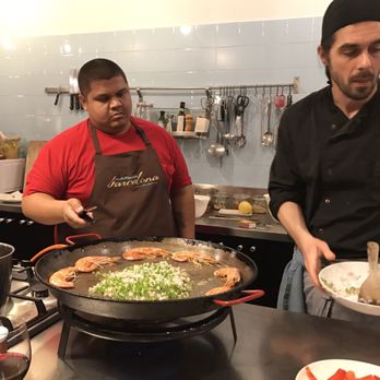 Cook & Taste - Chef going over prawns and vegetable cooking - Cooking Schools Near Me - Barcelona, B