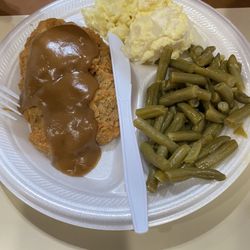 Grits Home Cookin - Country style steak with gravy, potato salad and green beans.