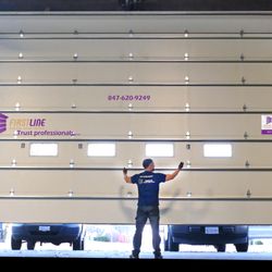 Firstline Garage Door Repair - New commercial garage door.