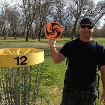 Dog Island Disc Golf Course - Dusty with an ace on hole 12 with a huklabs teebird - Disc Golf Near Me - Red Bluff, California