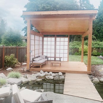 Sky Mountain Contractors - a patio with a gazebo and a pond - Fences & Gates Near Me - Auburn, Washington