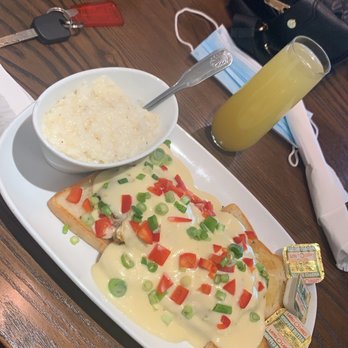 Another Broken Egg Cafe - crab cake Benedict with a peach mimosa - Breakfast & Brunch Near Me - Columbia, South Carolina Another Broken Egg Cafe - crab cake Benedict with a peach mimosa - Breakfast & Brunch Near Me - Columbia, South Carolina
