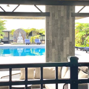 SCP Hilo Hotel - Lanai area that's covered with various comfy seating to relax or visit. - Hotels Near Me - Hilo, Hawaii SCP Hilo Hotel - Lanai area that's covered with various comfy seating to relax or visit. - Hotels Near Me - Hilo, Hawaii