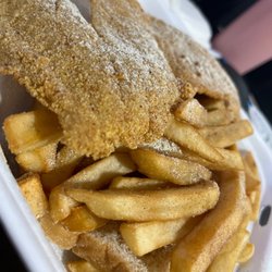 JJ Fish & Chicken - #7. Tilapia Fillets on top a bed of seasoned fries.