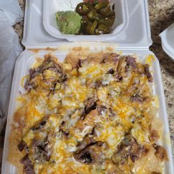 Casa Olé - Beef fajita nachos. They are packed full!