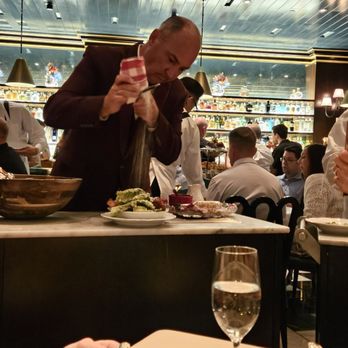 Carbone - Preparing Caesar Salad - Italian Near Me - Las Vegas, Nevada Carbone - Preparing Caesar Salad - Italian Near Me - Las Vegas, Nevada