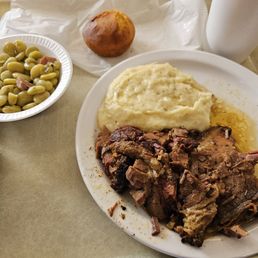 Pulled pork, grits, and lima beans.