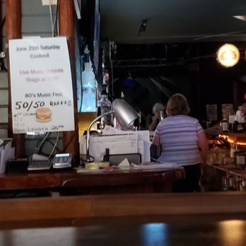 Short Branch Saloon - a woman sitting at the bar - Bars Near Me - Neenah, Wisconsin Short Branch Saloon - a woman sitting at the bar - Bars Near Me - Neenah, Wisconsin