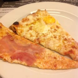 Pizzaclub No limits - Esempio di due tranci: tartufata con uovo; al prosciutto crudo
