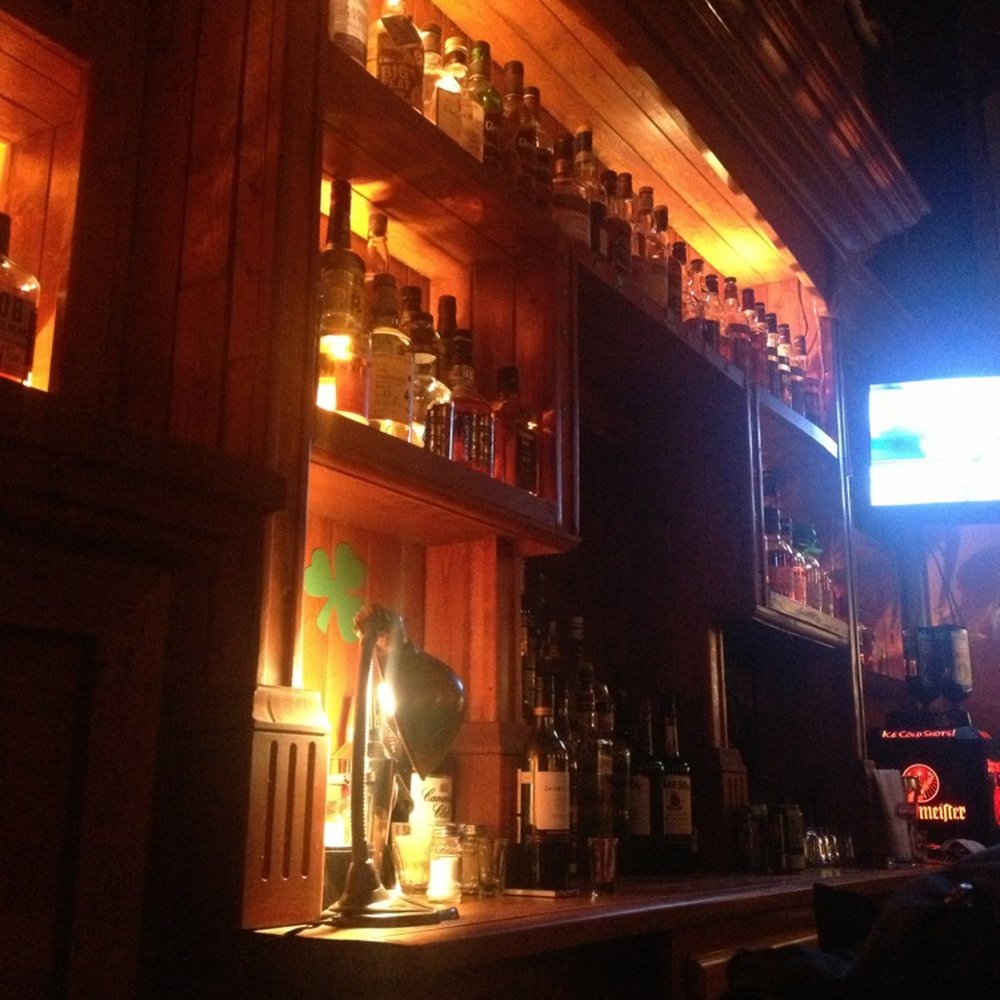 BEHIND the bar! BEHIND the bar!
