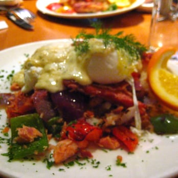 Plums Cafe - Famous Smoked Salmon Hash with 2 poached eggs and hollandaise sauce! - Breakfast & Brunch Near Me - Costa Mesa, California