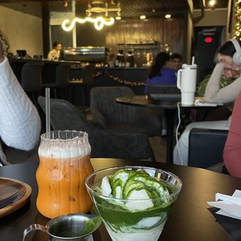 Sorbo - a woman sitting at a table in a restaurant - Wine Bars Near Me - Wesley Chapel, Florida