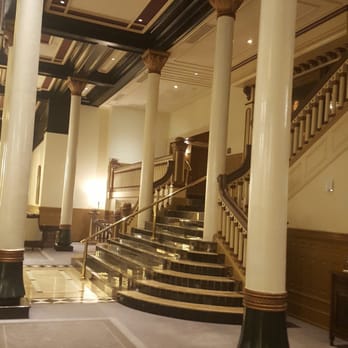 The Driskill - Staircase that leads to bar and elevators - Hotels Near Me - Austin, Texas