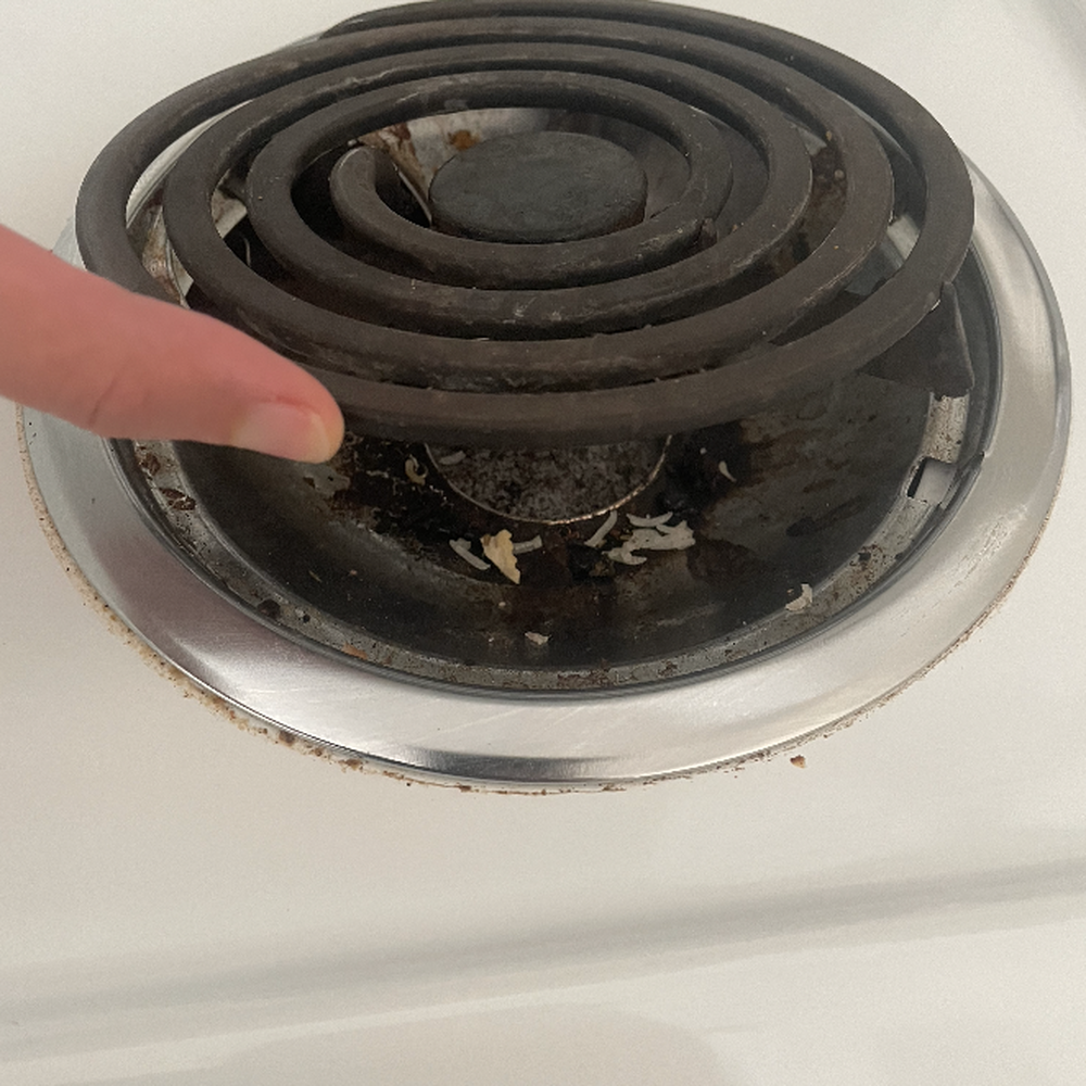 Stove after the cleaners left Stove after the cleaners left