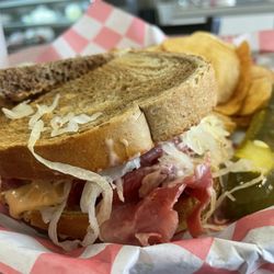 Italian Delights - Reuben Sandwich comes with chips and a pickle