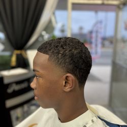 Paco's Fresh Kutts Barbershop - Skin taper with a 1 and a half on top #taper