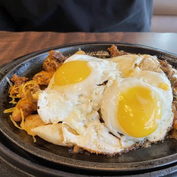 Denny's - two fried eggs on top of hash browns - Breakfast & Brunch Near Me - Las Vegas, Nevada Denny's - two fried eggs on top of hash browns - Breakfast & Brunch Near Me - Las Vegas, Nevada