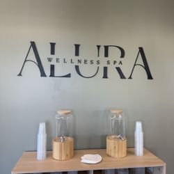 Alura Wellness Spa - Enjoy our membership lounge! Free WiFi, flavored waters, pressed juices, and comfortable seating in a large open space after any treatment.