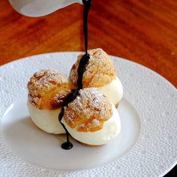 The Balcon - vanilla ice-cream profiteroles, hot chocolate and praline sauce - French Near Me - London, XGL