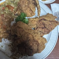 Big John's Grill - Three piece chicken dinner, with okra rice and pinto beans. With a side of cornbread.