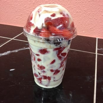 Snacks - Fresas con crema (strawberries and cream), essentially a strawberry parfait topped with raisins, coconut shavings, and granola. - Desserts Near Me - San Mateo, California Snacks - Fresas con crema (strawberries and cream), essentially a strawberry parfait topped with raisins, coconut shavings, and granola. - Desserts Near Me - San Mateo, California