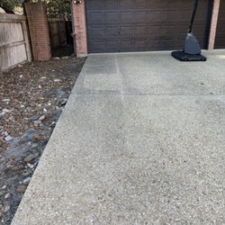 Security Fencing And Welding Construction - Black paint on aggregate driveway while Mr Picasso was painting the wrought iron fence posts