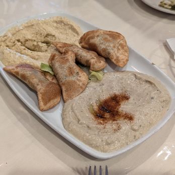 Miraj Healthy Grill - Trio starter plate: hummus (top), sambooseh (middle) and baba ganoush. - Persian/Iranian Near Me - Williston Park, New York Miraj Healthy Grill - Trio starter plate: hummus (top), sambooseh (middle) and baba ganoush. - Persian/Iranian Near Me - Williston Park, New York