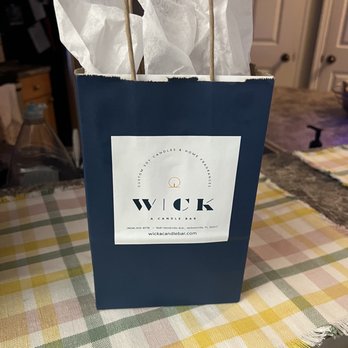 Wick A Candle Bar - The gift bag you will receive, including your candle, care instructions, and your paper that you filled out. - Candle Stores Near Me - Jacksonville, Florida